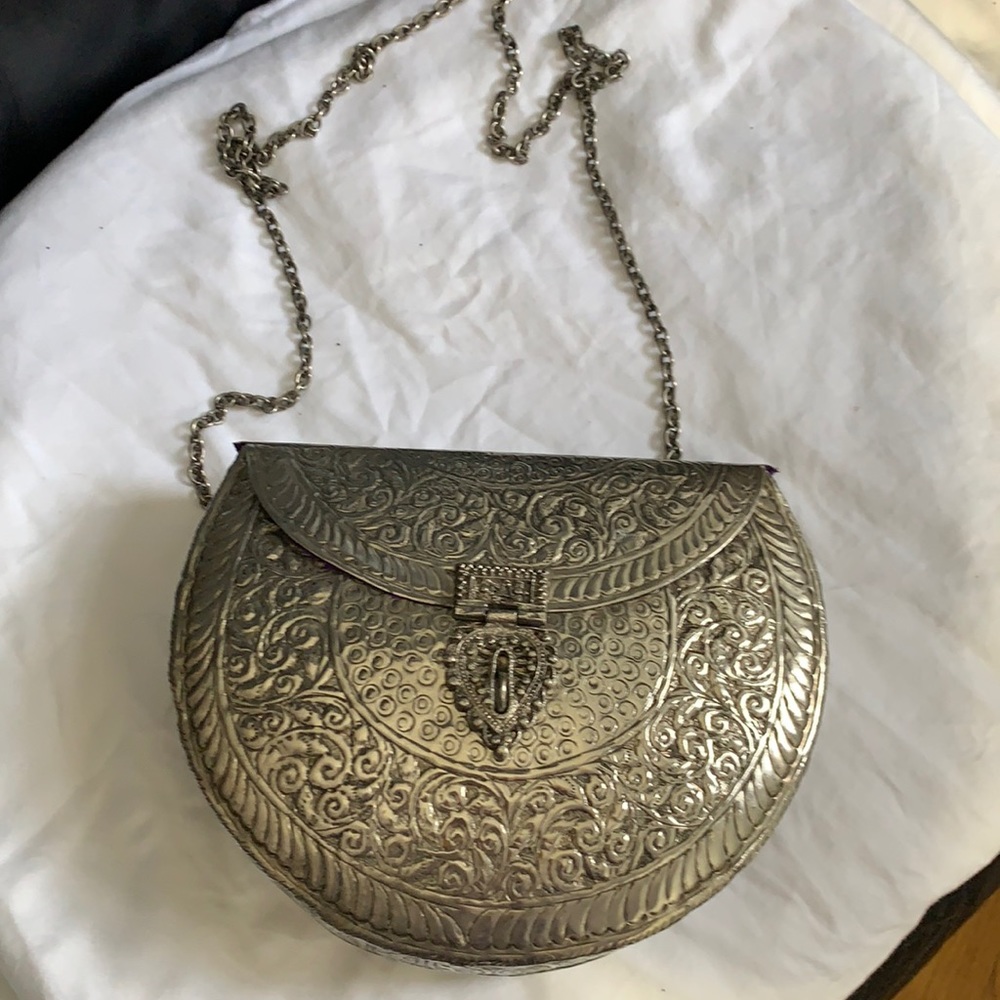 Silver metal shoulder carved handbag unusual